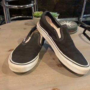Vans Black Slip Ons